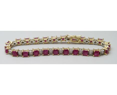 A 14k yellow and white gold claw set ruby and diamond line bracelet with box clasp and safety catch, 23 square cut rubies, es