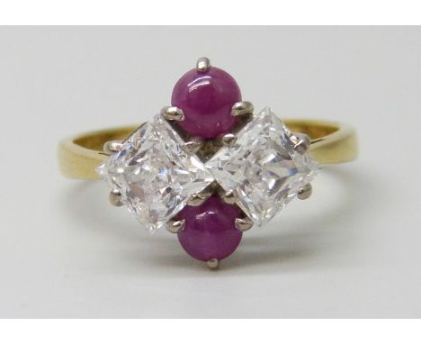 An 18ct gold, cabochon ruby and white stone ring, 3.9g, N
