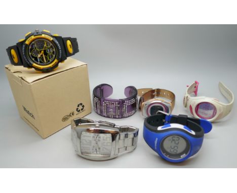 A collection of watches including Guess, Casio, etc.