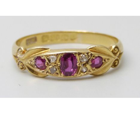 An 18ct gold, ruby and diamond ring, Birmingham 1908, boxed, 2.7g, Q