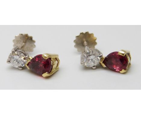 A pair of 18ct yellow and white gold claw set brilliant cut diamond and pendaloque cut ruby drop earrings, total estimated di