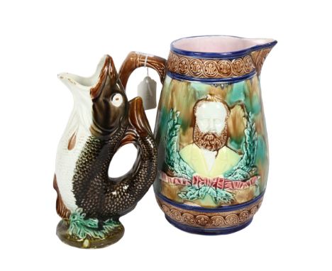 An Antique Majolica pitcher, depicting Ulysses S. Grant Civil War General, and a gurgle Majolica fish jug, largest 25cm (2) 