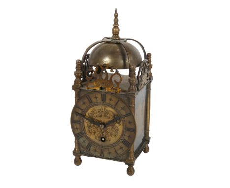 A brass-framed 4-pillar lantern clock, height 25cm, width 10cm 