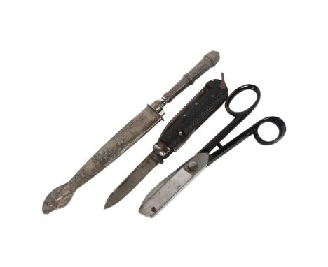 A Brazilian Inox Gaucho knife, with relief embossed scabbard, pair of tailor's shears and Vintage penknife by Clark & Sons (3