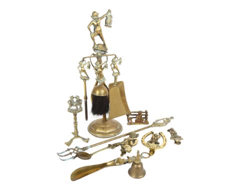 A group of Vintage Cornish brassware, including a companion set decorated with Dartmoor Pisky, brass door knockers etc 