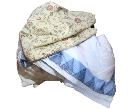 A quantity of Vintage eiderdowns 