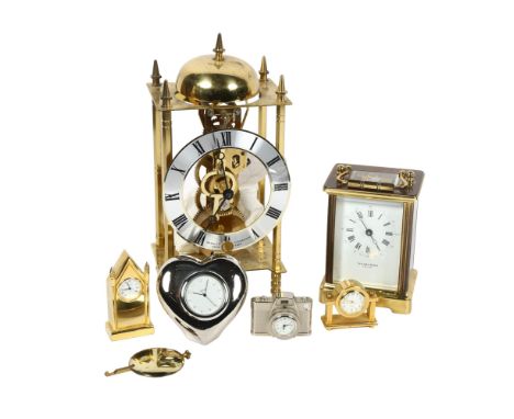 A carriage clock by Taylor & Bligh, a lantern clock and miniature clocks 