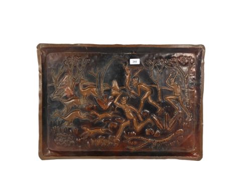 An African embossed copper tray, hunting scene, width 65cm, depth 45cm 