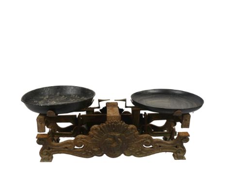 An Antique set of cast-iron balance scales, with relief cockerel motif, width 62cm 