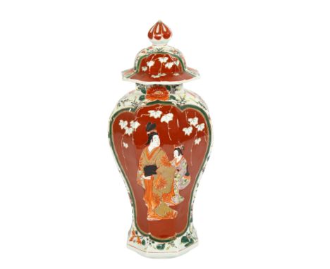 A Japanese panel vase and cover, with figural decorated panels on red ground, height 32cmVase and cover in good condition, no