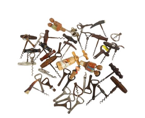 A collection of Vintage corkscrews and bottle stoppers, including some German Black Forest stoppers 