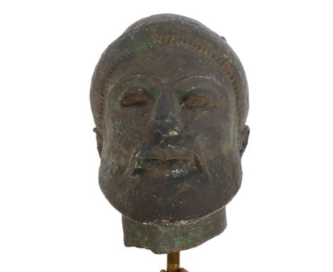 A painted plaster bust of a hoplite, height 28cm 