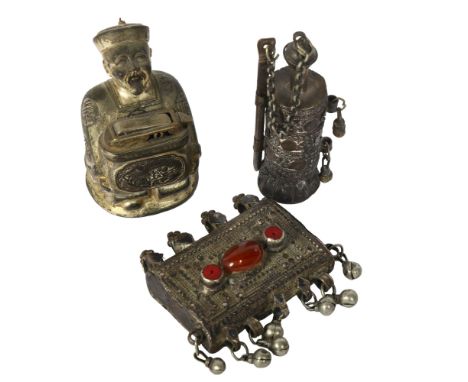 An Antique Turkish amulet, set with banded agate, an Oriental white metal burner, and a Japanese antimony table lighter (3) 