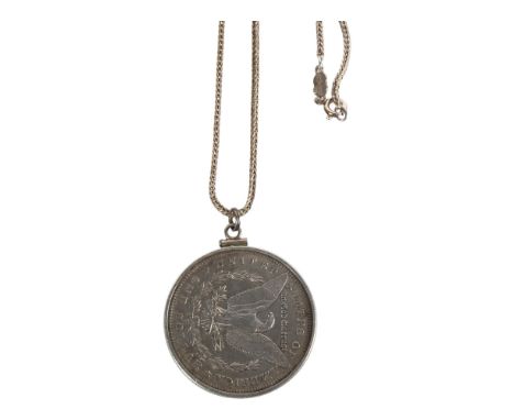 An 1884 American silver dollar and chain, chain marked 835 