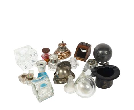 A collection of Vintage glass pewter inkwells, including a Swiss Guards design helmet inkwell, and a Moet & Chandon top hat d