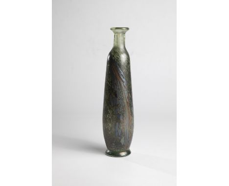 Vase Robert Pierini, 1984 Farbloses, dickwandiges Glas mit mehrfarbigen Kröselaufschmelzungen. Gelöste Metallverbindungen iri