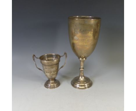 A George V silver Trophy Cup, hallmarked London, 1919, of goblet form, with presentation inscription, 30.7cm high, together w