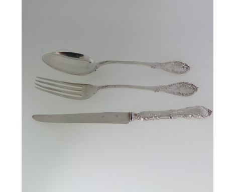 An early 20thC French silver Fork and Spoon, by Page Freres, with foliate decoration, the reverses monogrammed, both 18.5cm l