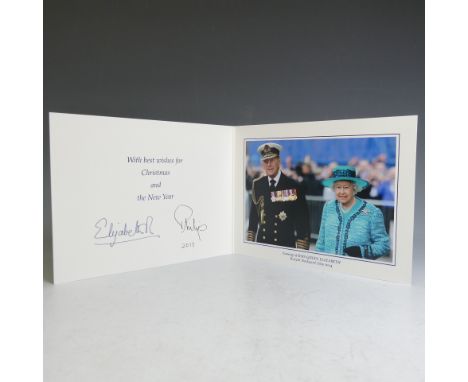 H.M.Queen Elizabeth II and H.R.H.The Duke of Edinburgh,&nbsp;signed 2014 Christmas card with twin gilt ciphers to cover, sign