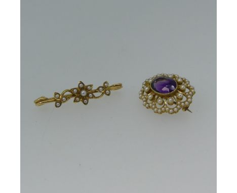 A 15ct gold, amethyst and seed pearl Brooch, the oval facetted amethyst 11.6mm x 8.6mm set within a surround of seed pearls, 