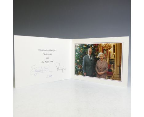 H.M.Queen Elizabeth II and H.R.H.The Duke of Edinburgh, signed 2010 Christmas card with twin gilt ciphers to cover, colour ph