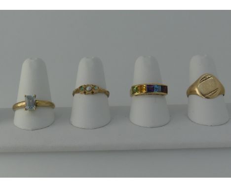 A 9ct gold multi-gem set Ring, Size N, together with a 9ct gold signet ring, Size O, a 9ct QVC ring set pale blue stone, and 