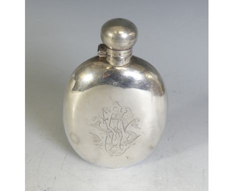 A late Victorian silver Hip Flask, by James Dixon &amp; Sons, hallmarked Sheffield, 1895, of oval form with hinged bayonet ca