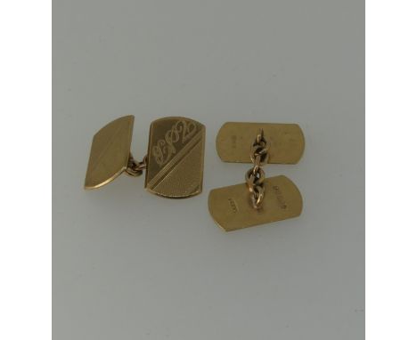 A pair of 9ct yellow gold Cufflinks, the fronts and reverses with engine turned decoration, one side initialled, approx total