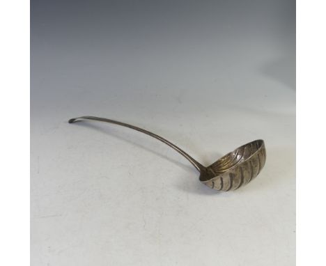 A George III Irish Silver Soup Ladle, by&nbsp;John Shiels, hallmarked Dublin 1774, Celtic point with shell bowl and bright cu