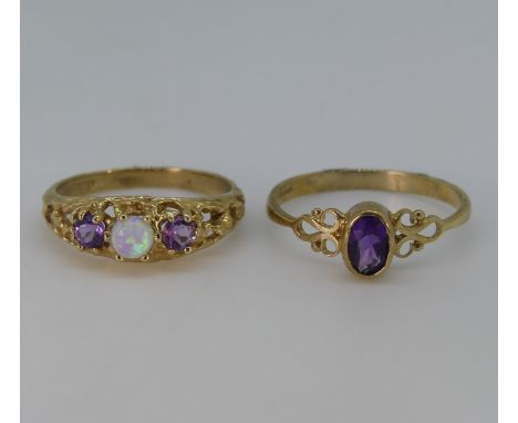 A small 9ct yellow gold and amethyst Ring, the oval stone collect set on open shoulders, Size P½, together with an amethyst a