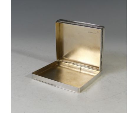 A George VI silver Cigarette Box, by&nbsp;Dyas Beverley Hampton, hallmarked London, 1947, of rectangular form with hinged lid