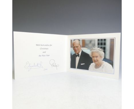 H.M.Queen Elizabeth II and H.R.H.The Duke of Edinburgh, signed 2011 Christmas card with twin gilt ciphers to cover, colour ph