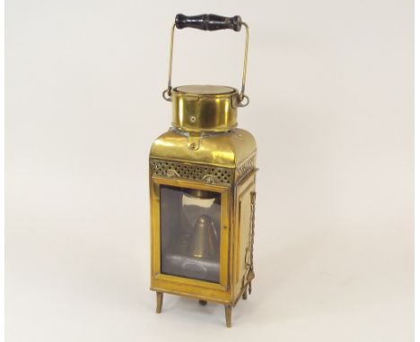 SHIP'S STORM LANTERN.A brass ship's storm lantern by Eli Griffiths, Birmingham, with burner by Bulpitt & Sons, Birmingham. La