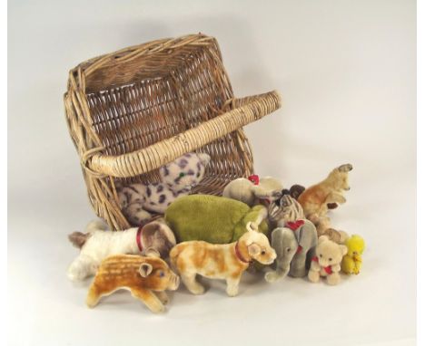 STEIFF ETC.A vintage wicker basket of soft toys, including a vintage Steiff elephant, zebra, kangaroo, cow & piglet. Also a g