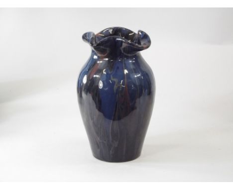 ELTON WARE. An Elton Ware, Sunflower Pottery vase with running glaze. Signed. Height 19cm.