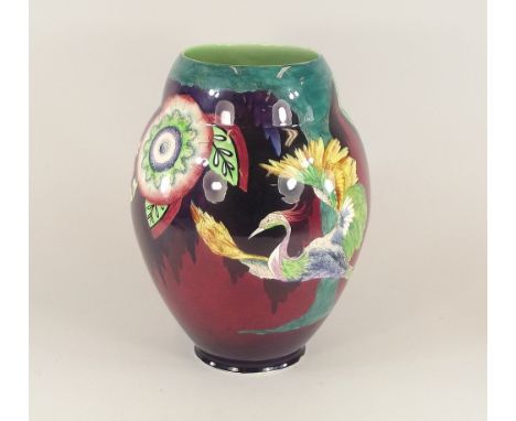 CARLTON WARE. A large 1930's Carlton ware vase, in the Secretary Bird pattern. Printed back stamp. Height 28cm. (Some damage)