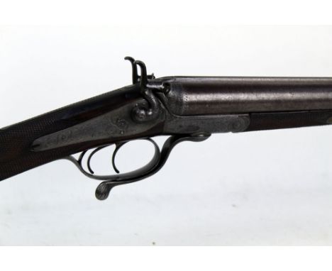 Samuel &amp; C Smith London, a 12 bore side by side hammer shotgun, with 30" Damascus barrels, cylinder and cylinder choke, 6