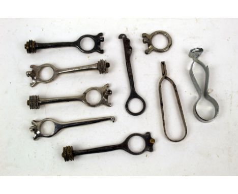 Nine cartridge extractor tools etc