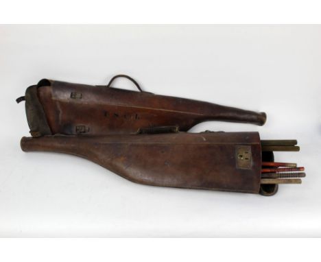 Two leather leg of mutton gun cases, first initialled T.S.C.L. with space for 30" barrels, the other containing cleaning rods