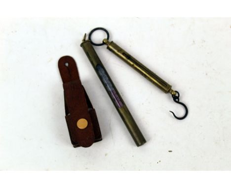 Hardy a brass thermometer, 14 cm including loop, together with a dry fly oiler and a Charles Farlow &amp; Co set of fish scal
