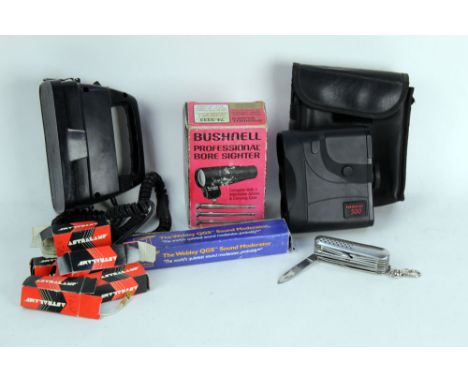 A Tasco 500 Rangefinder, together with a lamp, a Bushnell Professional Bore sighter, Webley sound moderator and a Swiss Army 