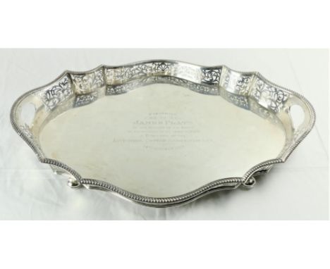 A very fine large heavy serpentine shaped oval silver Tray, Sheffield 1924, by Walker &amp; Hall with gadroon edge and cut ou