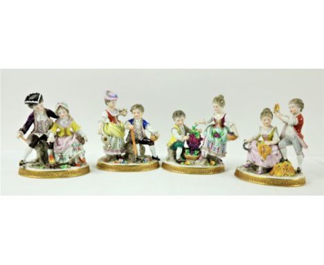 A set of four attractive late 19th Century&nbsp; Sitzendorf hand painted Figural Statues, depicting the "Four Seasons" each a