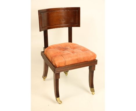 A late Regency period mahogany "Klismos" Side Chair, probably Irish, with deep curved panel back on reeded supports and later
