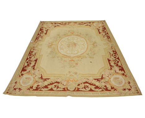 An attractive Aubusson style petti-point Tapestry Carpet or Wall Hanging, with centre floral oval medallion inside a red flor