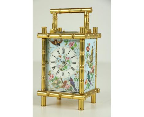 An important 19th Century French 8 Day porcelain Carriage Clock, decorated with painted panels depicting birds, flowers and l