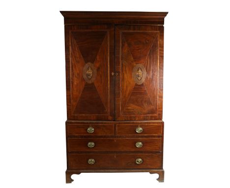 A very good George III period inlaid mahogany Linen Press / Wardrobe, the moulded cornice over two large panel doors in finel