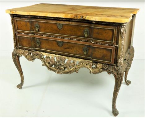 An 18th Century (possibly American) walnut and parcel gilt Commode, of inverted breakfront outline with two drawers, the base