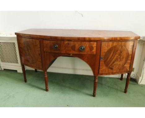 A fine attractive George IV inlaid and bow fronted&nbsp;Sideboard, with centre frieze drawer over an arch, flanked either sid