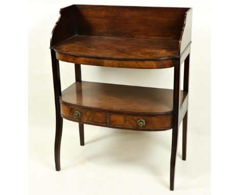 An Irish George IV period mahogany bow fronted Dressing Table / Washstand, by Gillingtons, No: 455B, stamped, with three-quar